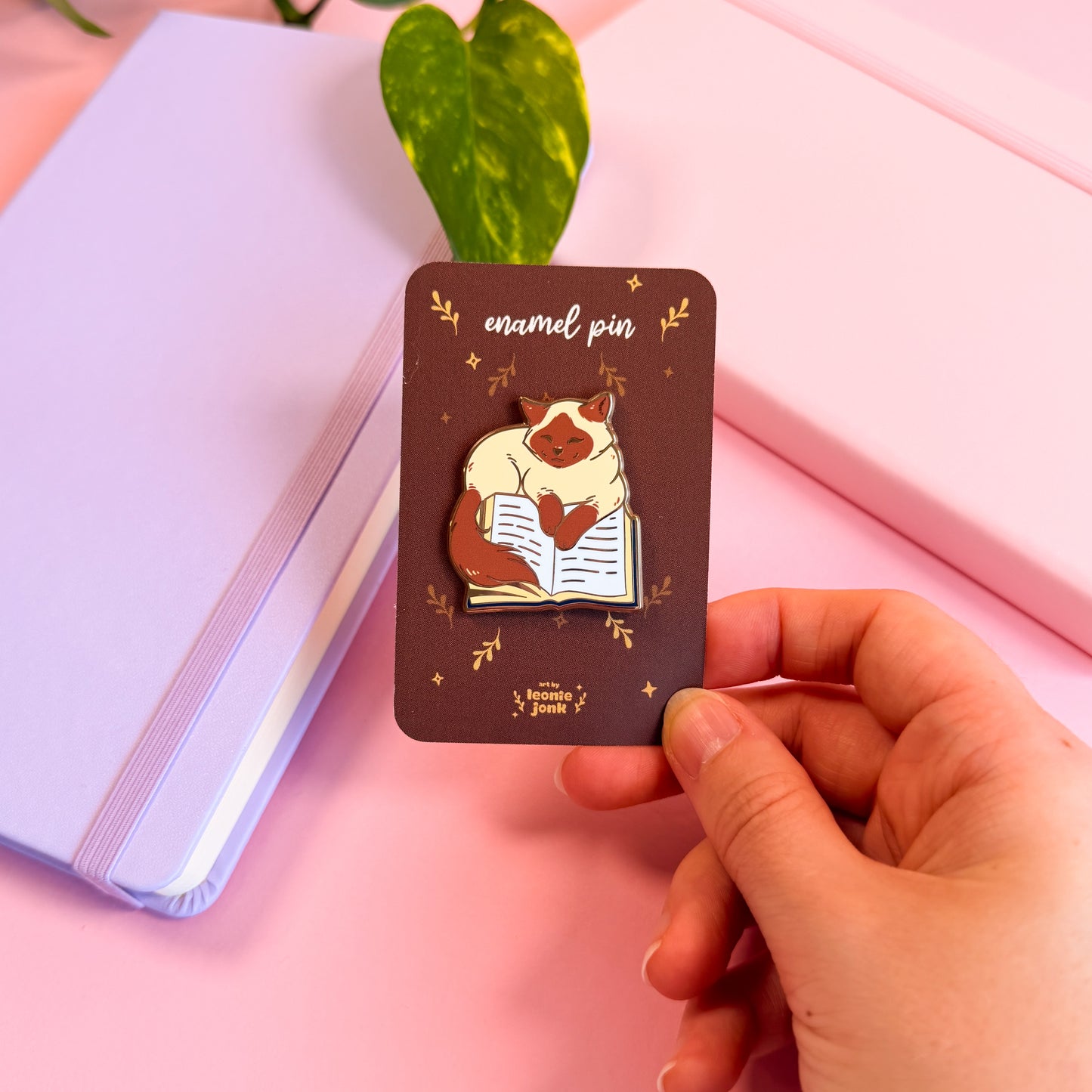 Cat on book Enamel Pin