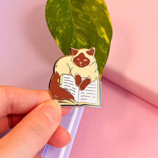 Cat on book Enamel Pin